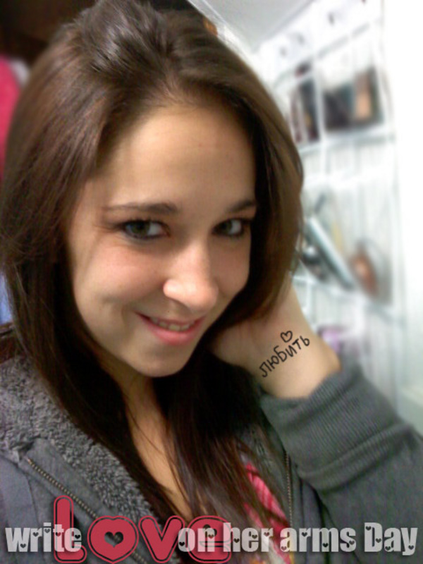 To Write &quot;Love&quot; on her arms day